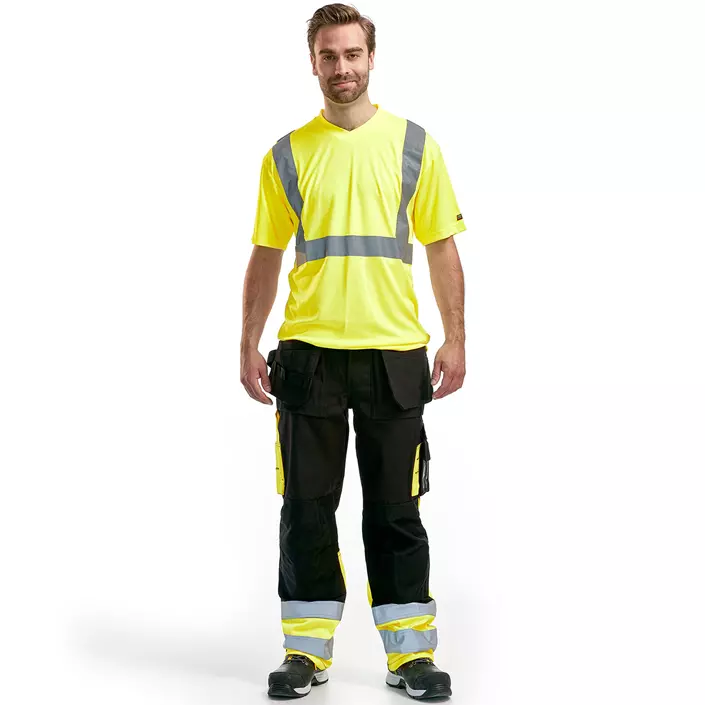 Blåkläder craftsman trousers, Black/Hi-Vis Yellow, large image number 1