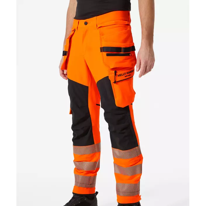 Helly Hansen ICU BRZ craftsman trousers full stretch, Hi-vis Orange/Ebony, large image number 1