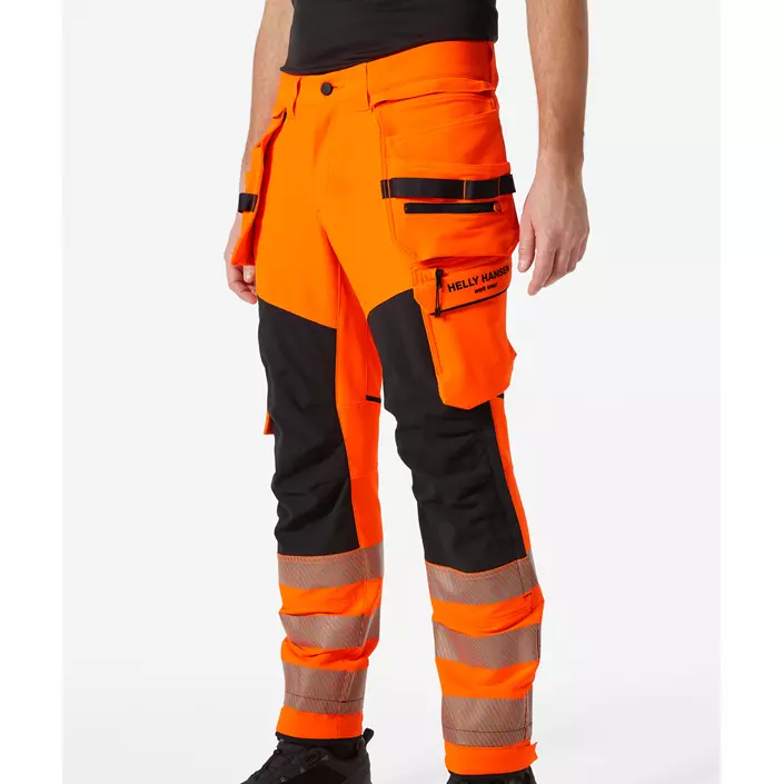 Helly Hansen ICU BRZ craftsman trousers full stretch, Hi-vis Orange/Ebony, large image number 1